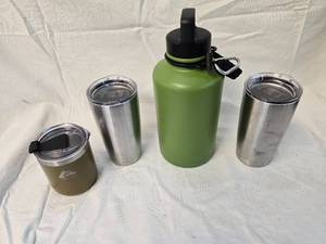 lot 57 image: (2) Yeti Thermal Mugs and Two Ozark Thermals