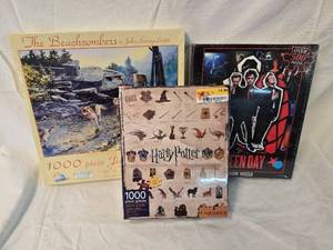 lot 92 image: (3) Puzzles