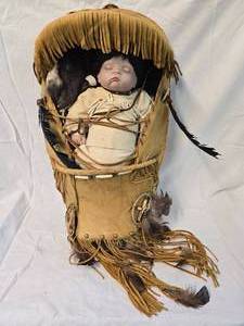 lot 115 image: Native American Doll and Cradle