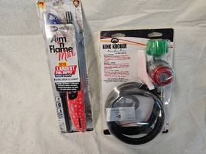 lot 126 image: Gas Line Adapter and 2 Pack of New Lighters