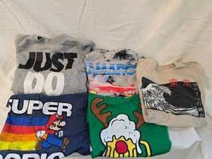 lot 187 image: (4) Medium Tee Shirts and (1) Just Do It, Sweat Shirt