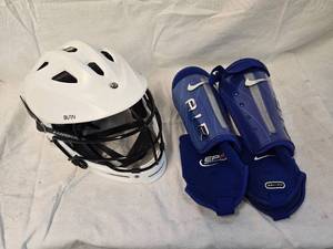 lot 213 image: Helmet and Leg Protectors