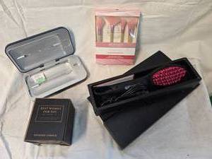 lot 222 image: (2) Hair Straighteners, Makeup Brushes, Makeup Light, Candle