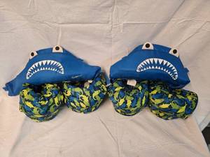 lot 264 image: (2) Kids Shark Floaties