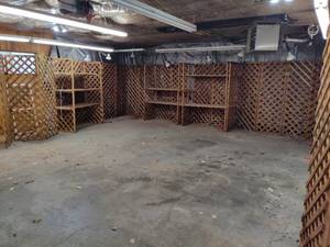 lot 200 image: Craft Booth Lighted Lattice Display (30x10 Booth)