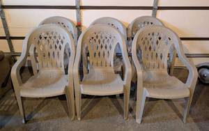 lot 119 image: Grey Stackable Resin Patio Chairs