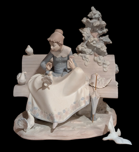 lot 89 image: Lladro Feeding the Pigeons Porcelain Figurine