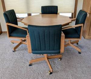 lot 27 image: Vintage Round Dining Table and Rolling Chairs