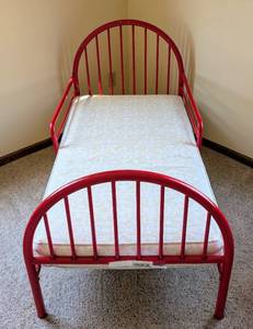 lot 64 image: Red Metal Toddler Bed Frame