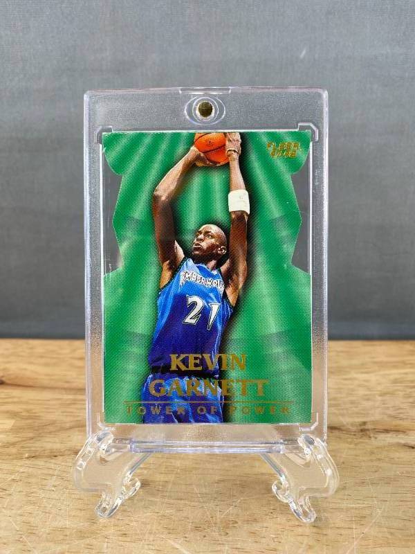 lot 18 image: 1997-98 Fleer Kevin Garnett Tower of Power Blue Insert Die Cut #4 T
