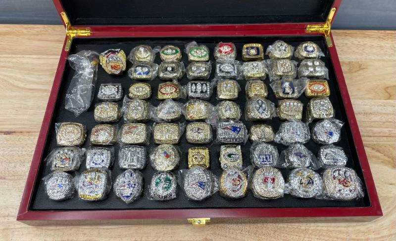 lot 2E image: WOW Brand New NFL Football Super Bowl Championship Ring Set - 58 Rings in Beautiful Display Case with Lombardi Trophy Packers Chiefs Raiders Patriots 49ers Brady Favre Namath Montana Mahomes O