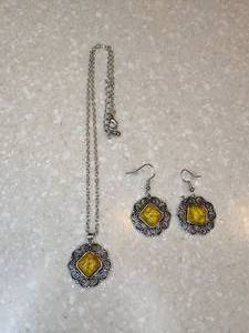 lot 403 image: New Three Piece Bohemian Necklace Pierced Earrings Rectangular Round Hollow Yellow P