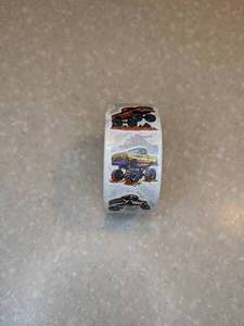 lot 422 image: Roll Of 500 Monster Truck Stickers Brand New P