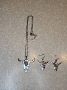 lot 425 image: New Bohemian Style Cow Head Necklace Pierced Earrings Inlaid Turquoise Silvery P