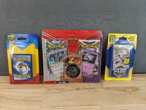 lot 16 image: Brand New Pokemon Cards Mystery Packs, RevavroomArmarougeHounstone 2 Blister Pack N