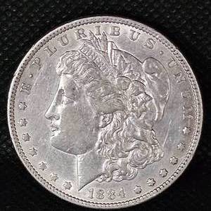 lot 14 image: 1884 Morgan Silver Dollar