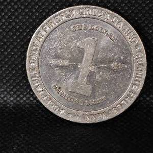 lot 18 image: Original FIRE FLY CREEK CASINO, Silver Clad $1 Token