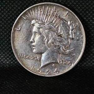 lot 68 image: 1924 Toned Peace Dollar