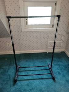 lot 202 image: Adjustable Metal Garment Rack with Wheels