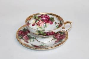 lot 23 image: Royal Sealy China Japan Rose Pattern Teacup and Saucer Set