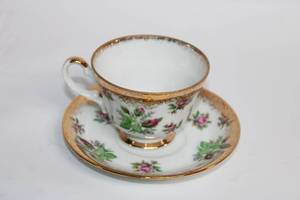 lot 24 image: Napco China Hand-Painted Rose Tea Cup and Saucer