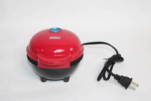 lot 51 image: Dash Mini Pie Maker Machine