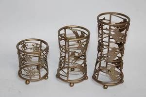 lot 69 image: Set of 3 Bronze Candle Holders with Holiday Decorations