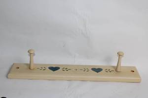 lot 83 image: Vintage Wooden Wall Rack with Heart Design