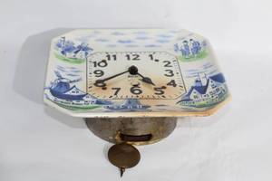 lot A-93 image: Antique Porcelain Windmill Design Mantel Clock