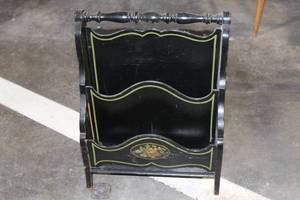 lot 131 image: Vintage Black Wooden Magazine Rack with Floral Accent