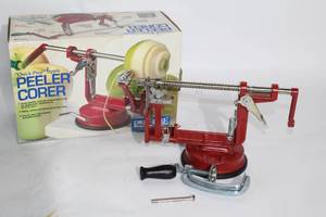 lot 161 image: Progressive Red Quick Prep Apple Peeler Corer with Attachments