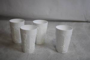 lot 229 image: Set of 4 Vintage White Milk Glass Cups with Grape Vine Design