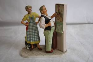 lot 240 image: Norman Rockwell Figurine Winter - New Year Look First Edition by Gorham