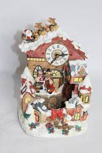 lot 296 image: Holiday Village Clock Tower with Santa and Reindeer Figurine