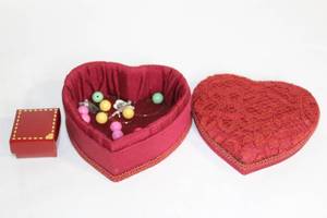 lot 338 image: Heart-Shaped Lace Jewelry Box with Assorted Beads and Angel Pendant