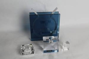lot 341 image: Collection of Lucite Candle Holders and Blue Glass Vase