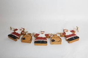 lot 412 image: Set of 4 Handcrafted Wooden Santa Ornaments by Norma Elizabeth