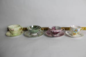lot 449 image: Set of 4 Vintage Floral Teacup and Saucer Sets