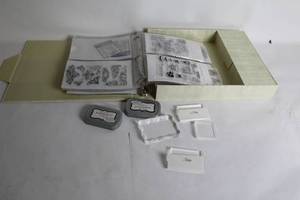 lot 471 image: Comprehensive Set of Rubber Stamps and Ink Pads with Storage Binder