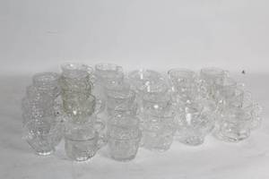 lot 487 image: Collection of 32 Vintage Clear Glass Tea Cups with Intricate Designs