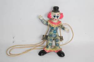 lot 494 image: Vintage Porcelain Clown Figurine on Swing