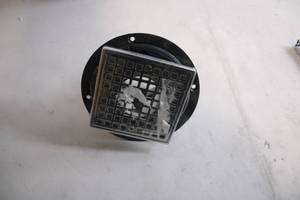 lot 306 image: Round Floor Drain with Square Stainless Steel Grate