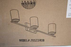 lot 2 image: Trans Globe 3-Light Fixture with Rubbed Oil Bronze Finish