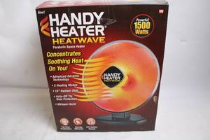 lot 11 image: Handy Heater Heatwave Parabolic Space Heater