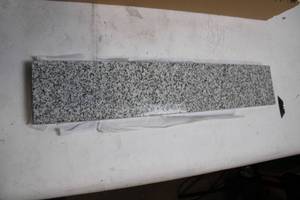 lot 16 image: Gray Granite Stone Slab 24 x 4
