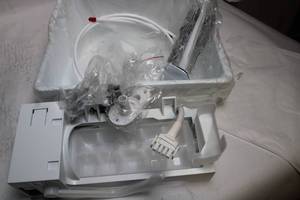 lot 30 image: Ice Maker Kit with Parts and Tubing