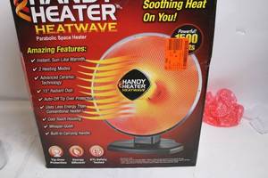 lot 32 image: Handy Heater Heatwave Parabolic Space Heater with Ceramic Technology