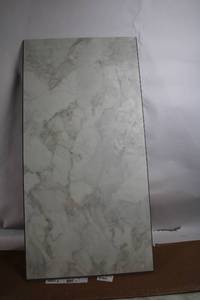 lot 153 image: Case of 4 Ashen Grove Marble Tiles 18.5x37 Inches