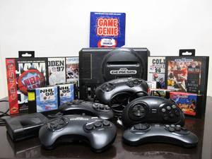 lot 48 image: SEGA GENESIS Video Game System wControllers, Games Cords & Accessories