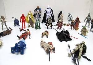 lot 143 image: Large Group of STAR WARS Action Figures wWeapons